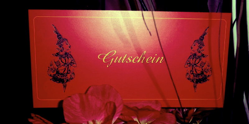 Roter Gutschein für eine Thai Massage bei Kitty in Stuttgart.